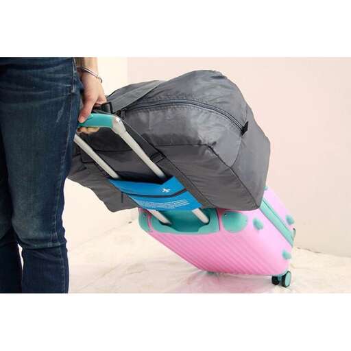 a woman is pulling a suitcase with a suitcase.