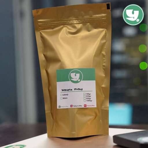 a bag of coffee on a table.