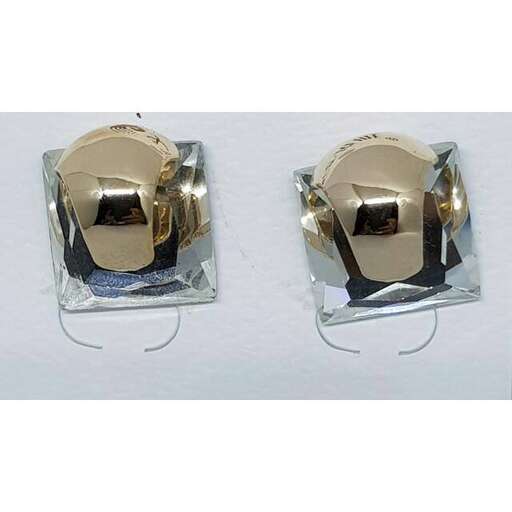 a pair of wedding rings in a silver box.