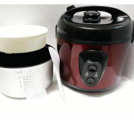 a black and white blender with a white label.