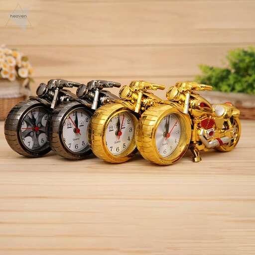 a bunch of clocks that are on a table.
