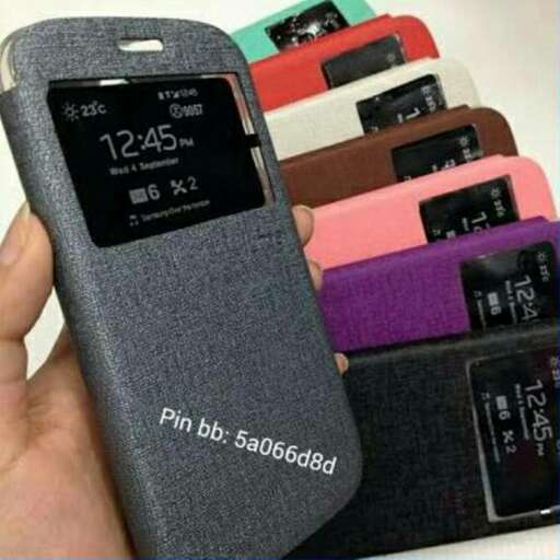 a cell phone with a small hole in the back.