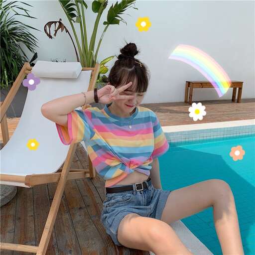 a girl sitting by a pool