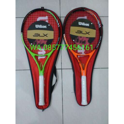 a pair of tennis rackets with a picture of a man on them.