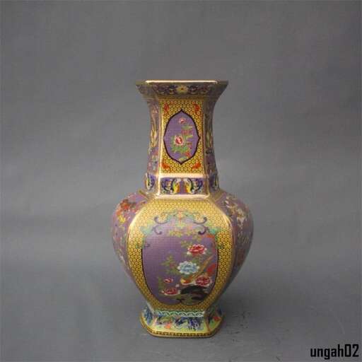a vase with a colorful design on it