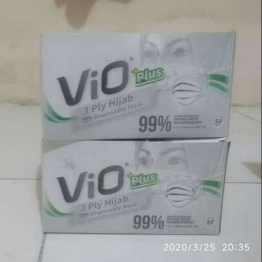 a package of a woman's face on a counter.