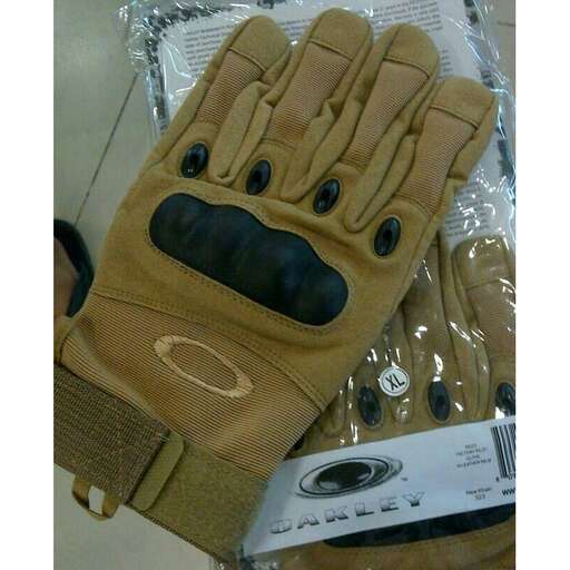 a pair of gloves with a face on them.