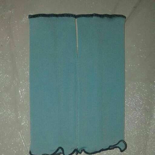 a blue and white rug with a black border.