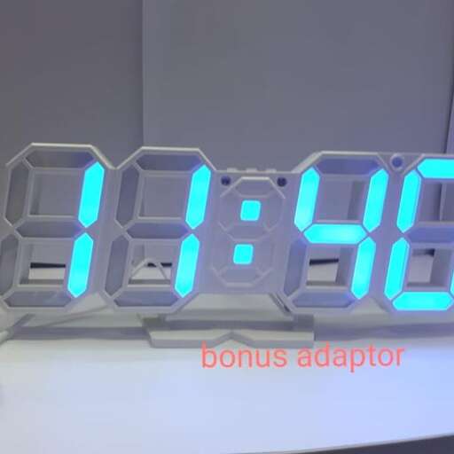 a digital clock with blue numbers and numbers.