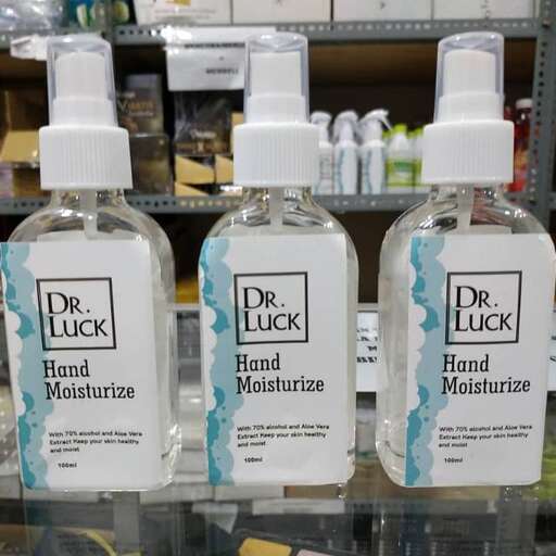 a bottle of hand sanitizer on display in a store.