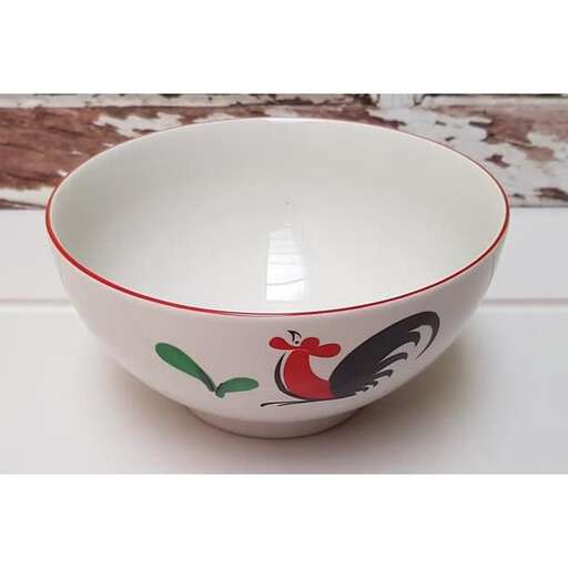a bowl that has a picture of a person on it.