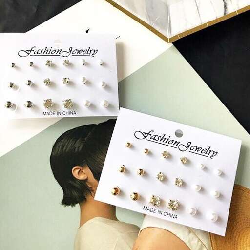 a set of earrings in a box