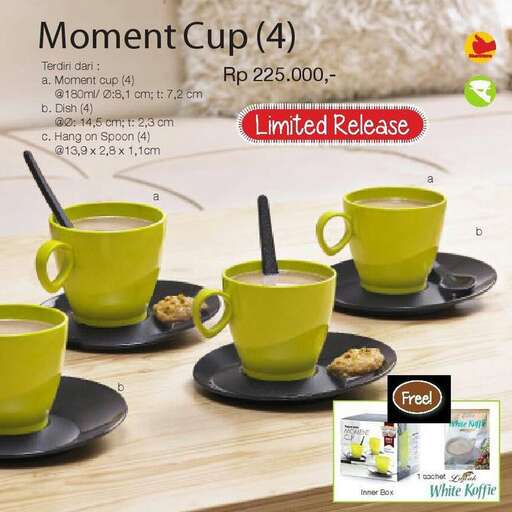 a cup of tea with a spoon in it