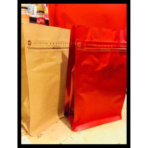 a red bag in a black frame