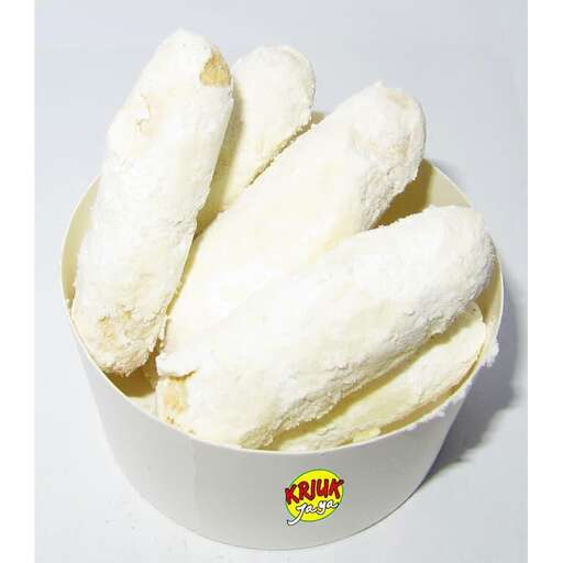 a bowl of ice cream sitting on top of a white surface.