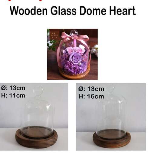 glass lantern with wooden base and glass base.