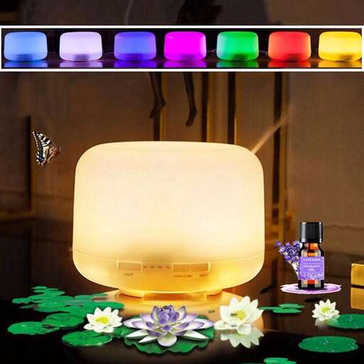 a light that is on a table with flowers.