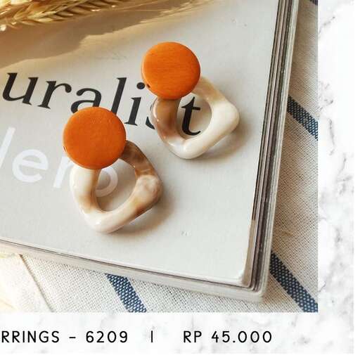 these earrings were made from recycled plastic bags.