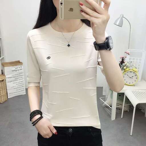 white v - neck t - shirt with a black belt