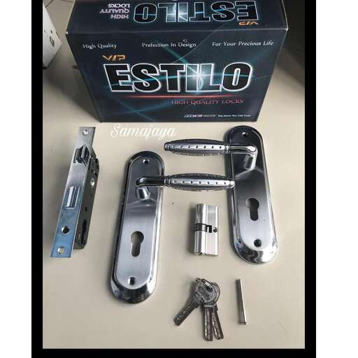 a box of keys and keys on a table.