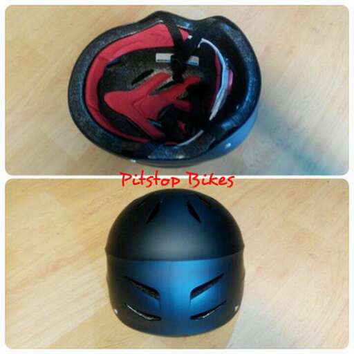 a helmet with a red and black design
