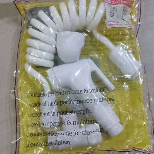 a plastic clip for a hairbrush