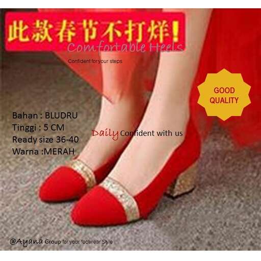 a woman in red shoes with a gold belt