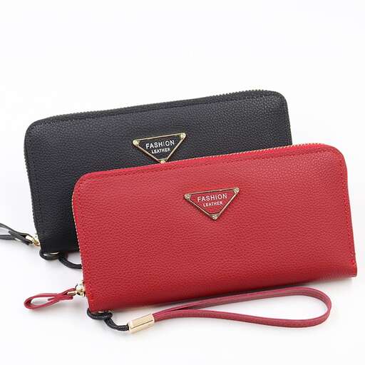 the black leather bag with a red strap