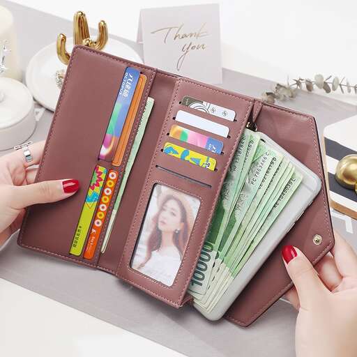 a wallet with a picture of a woman holding cash