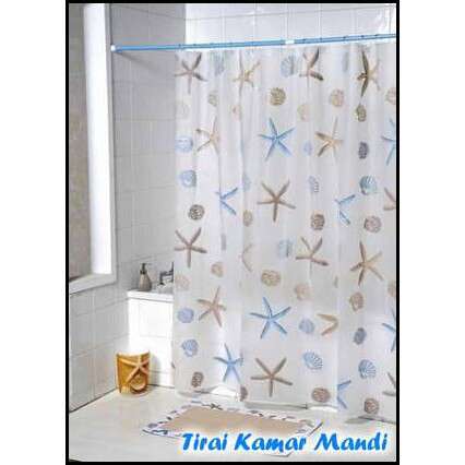 a bathroom with a shower curtain and a blue and gold star shower curtain.