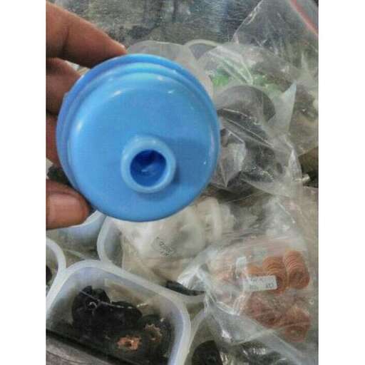 a blue plastic lid with a blue lid.