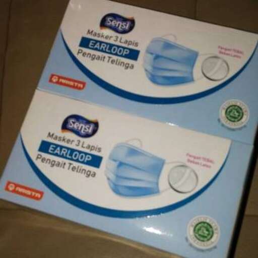 a package of toothbrushes for sale on a box.