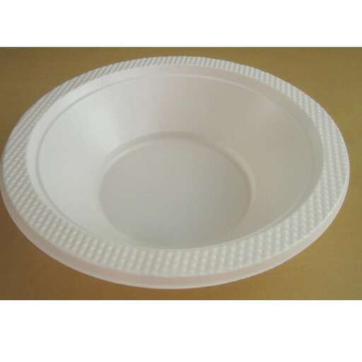 a large white plate with a curved edge.