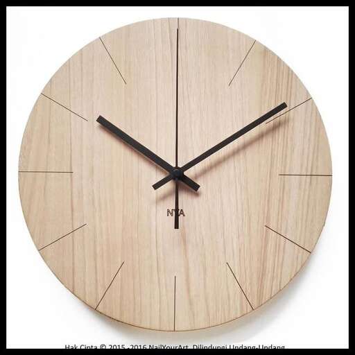a wooden clock with a wooden frame