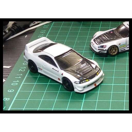 a close up of a model car on a table