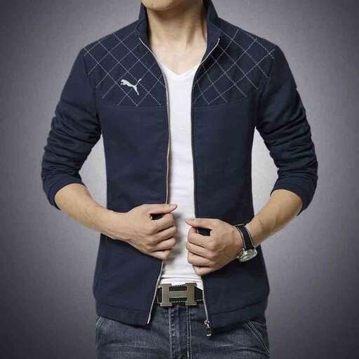 a man wearing a white shirt and jeans