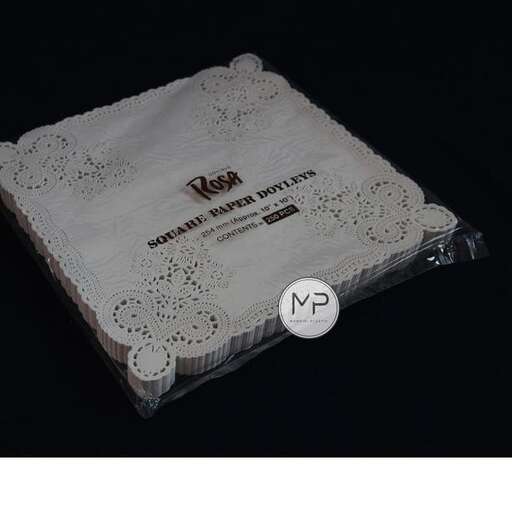 the box is covered in white paper and covered with lace.