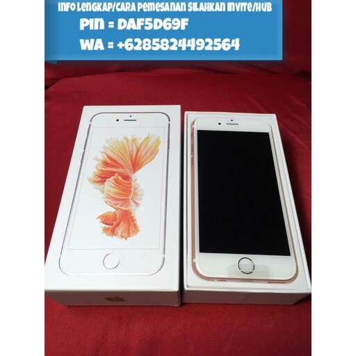 a white iphone box with a picture of a flower on the screen.