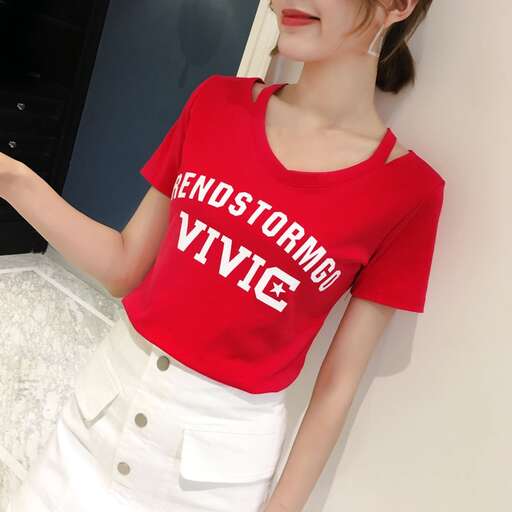 a red shirt with white letters on it.