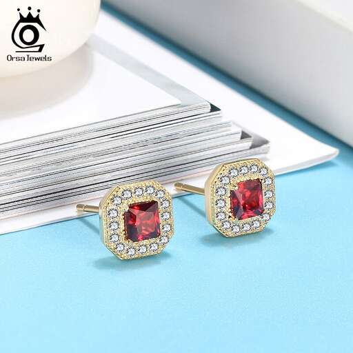 a pair of 18k yellow gold and diamond earrings