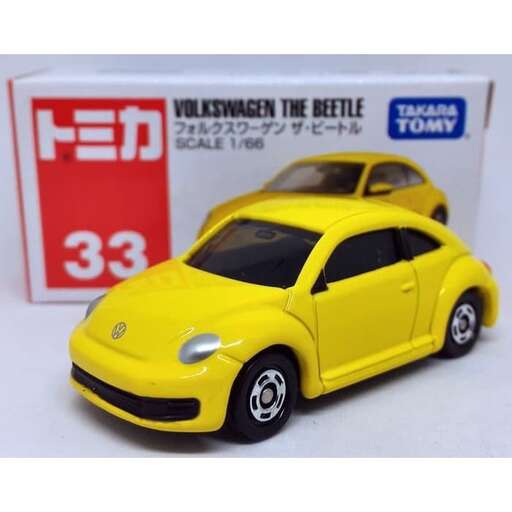 a yellow toy car with a white background.