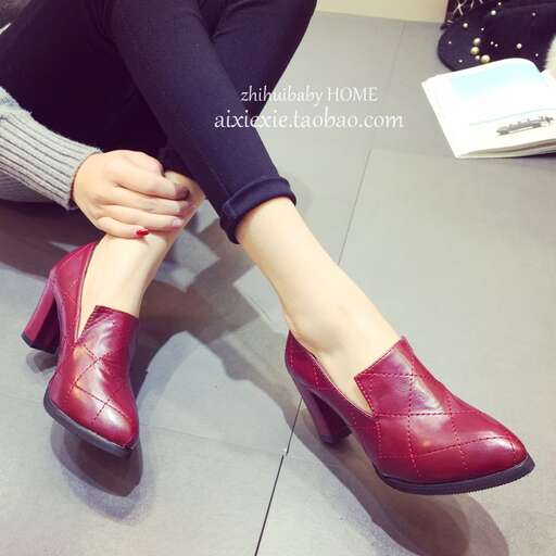 red leather shoes with a touch of red