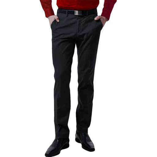 a man in a red sweater and black pants