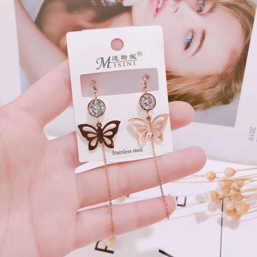 earrings in sterling silver with a butterfly on the front.