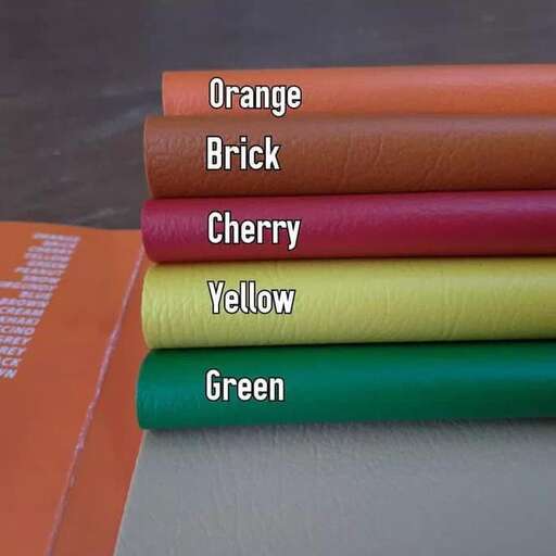 orange and green bricks with orange lettering on them.