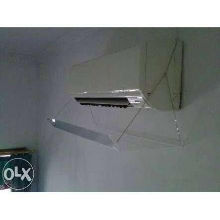a shelf with a box on it