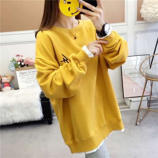 yellow top with a cute design