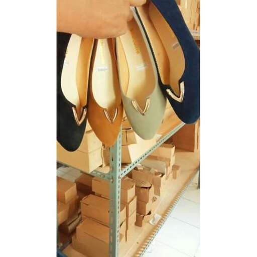 a rack with a pair of shoes on it.