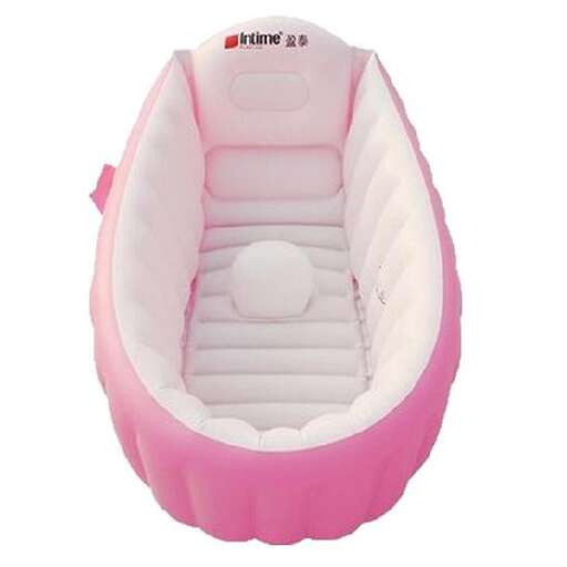 a pink and white boat for a baby