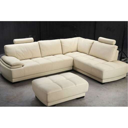 a white leather couch with a white leather seat.